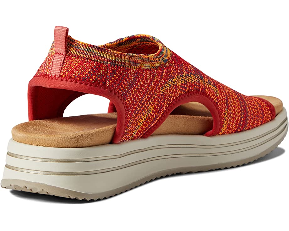 3/4 view of rieker women's jocelyn slip on in orange multi color