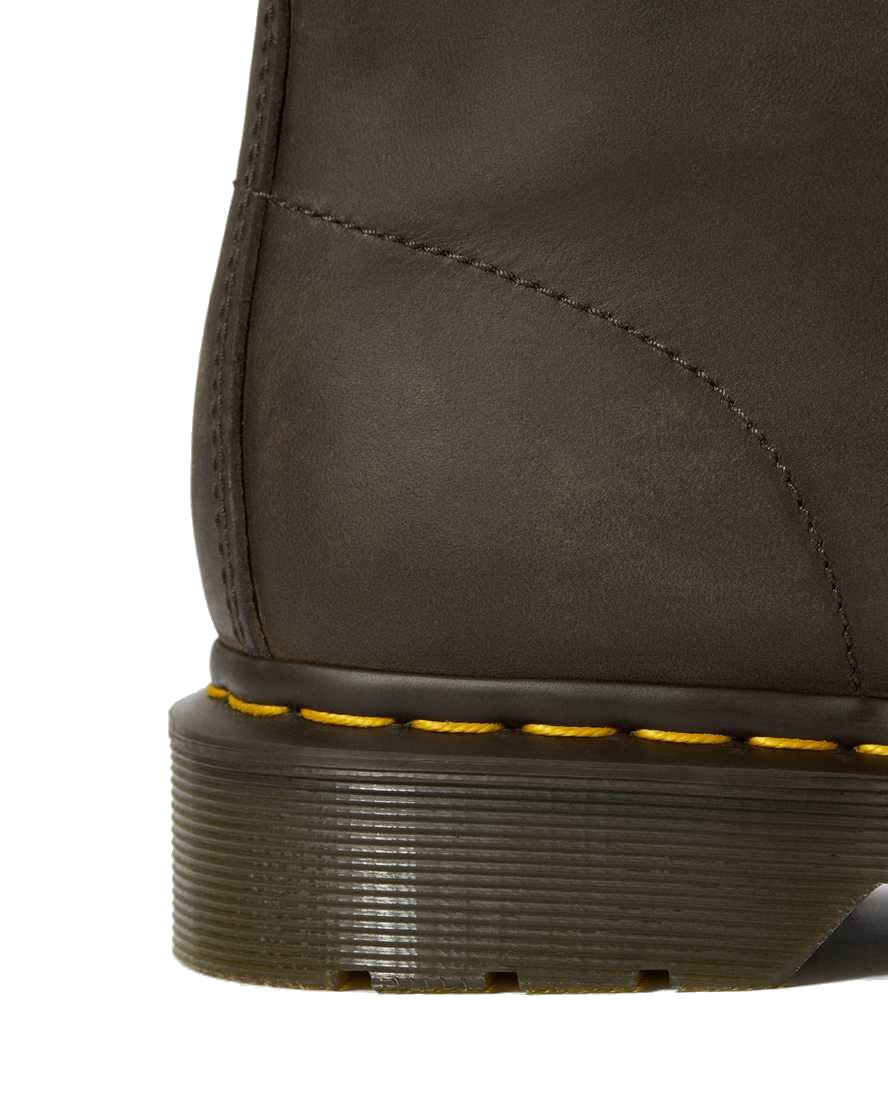 close image of sole of doc marten brown crazy horse detailing the sole and yellow stitching