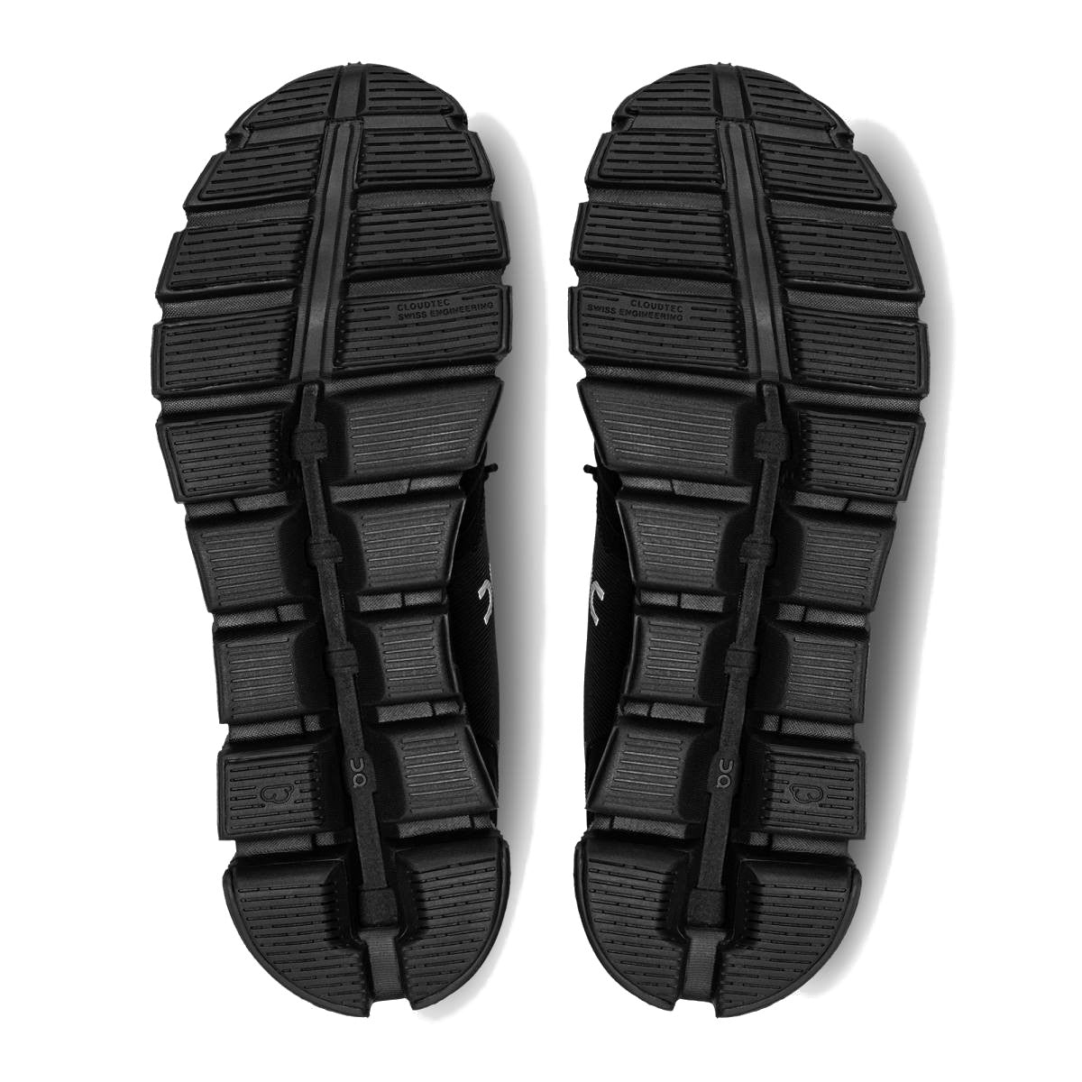 view of soles of two of on running's cloud 5 waterproof shoes in all black