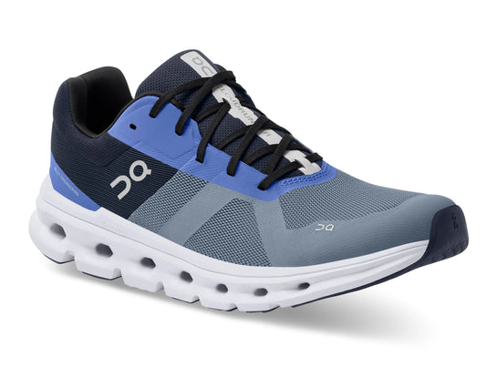3/4 view of on running cloudrunner shoe in blue and grey with a white sole - midnight/metal